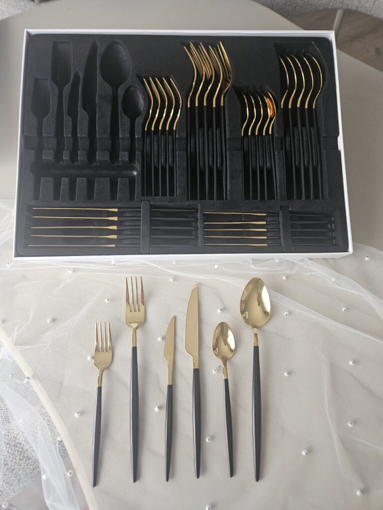 Coffret de couverts dorés manches nacrés effet opale noire (36 pièces - 6 personnes)